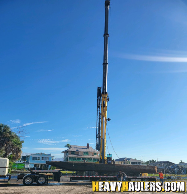 Wilson conveyor trailer shipped on an RGN.