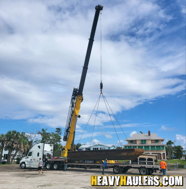 Wilson conveyor trailer shipped on an RGN.