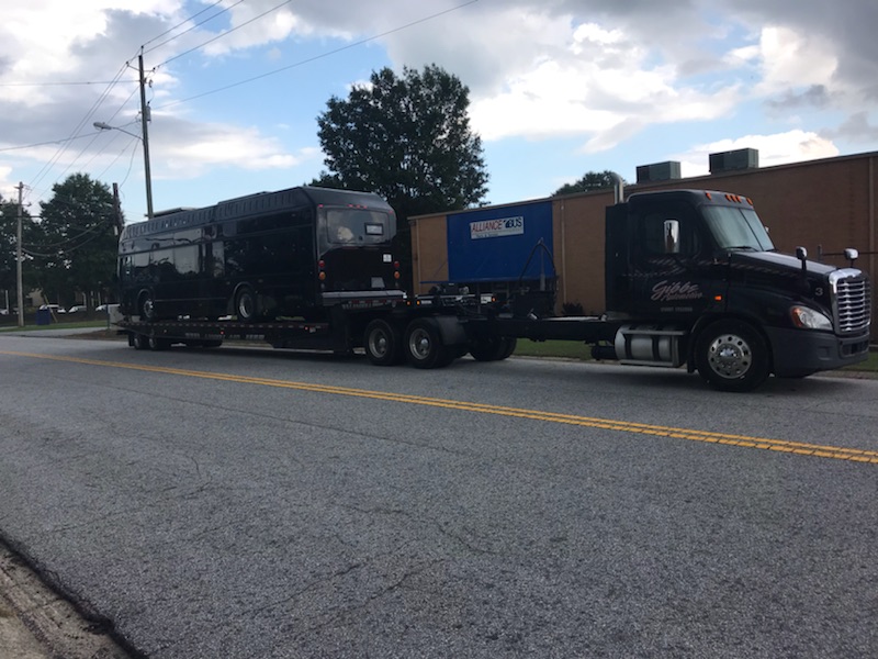 Highway bus being transported