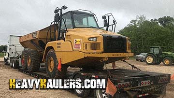 Moving a Caterpillar articulated dump truck.