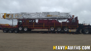 Oversize crane transported on a lowboy trailer