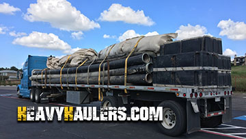 Equipment hauled on a Flatbed trailer.