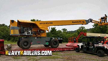 Loading a Haulotte telescopic handler on an RGN trailer.