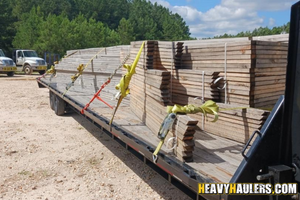 Wood trusses loaded on a hot shot trailer.