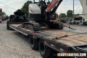 Bobcat E35 compact excavator haul.