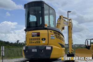 1997 CAT 320BL transport.