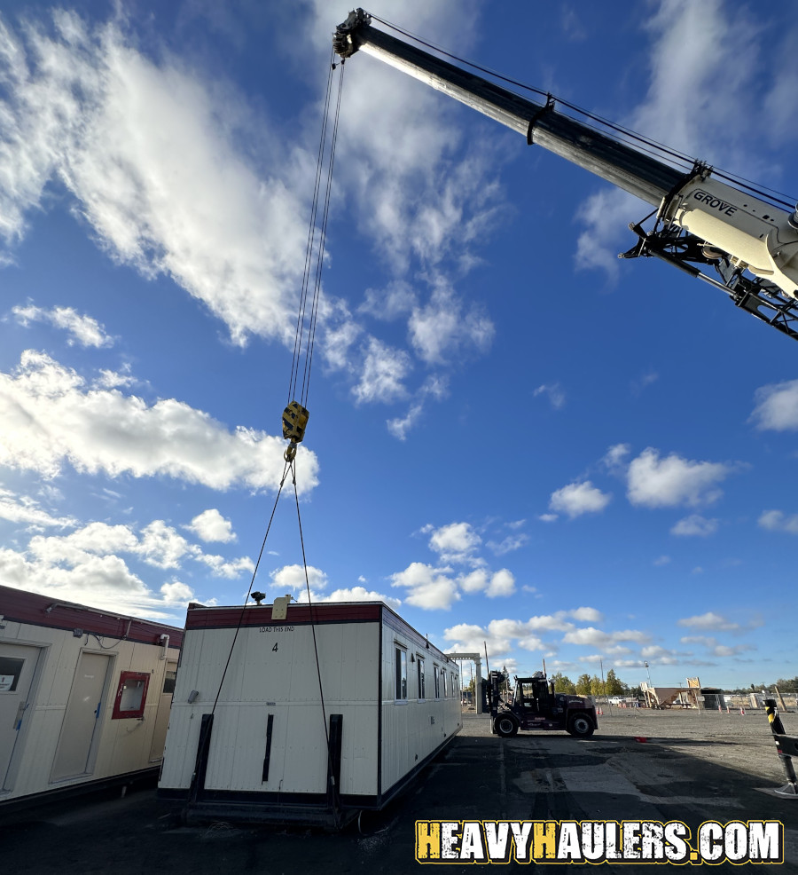 Wilson conveyor trailer shipped on an RGN.