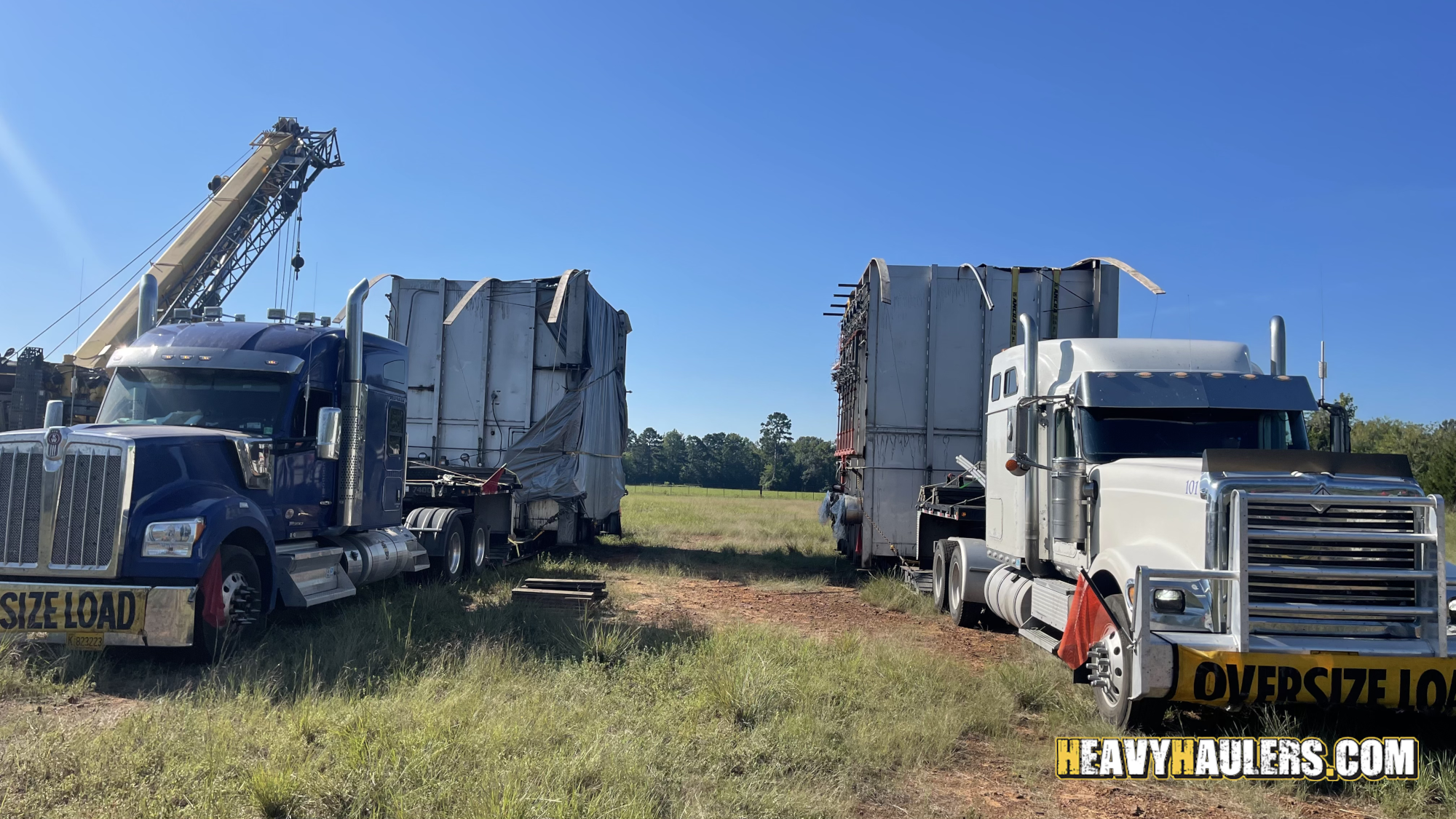 Transporting two oversize steel furnaces.