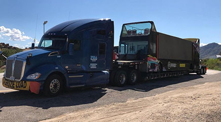 Transporting a 1990 AM General military trucks