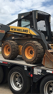 Shipping a New Holland backhoe