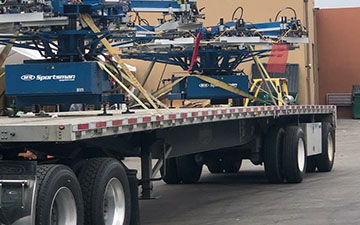 Printing press being hauled