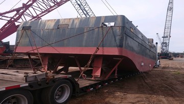 Tugboat being moved.